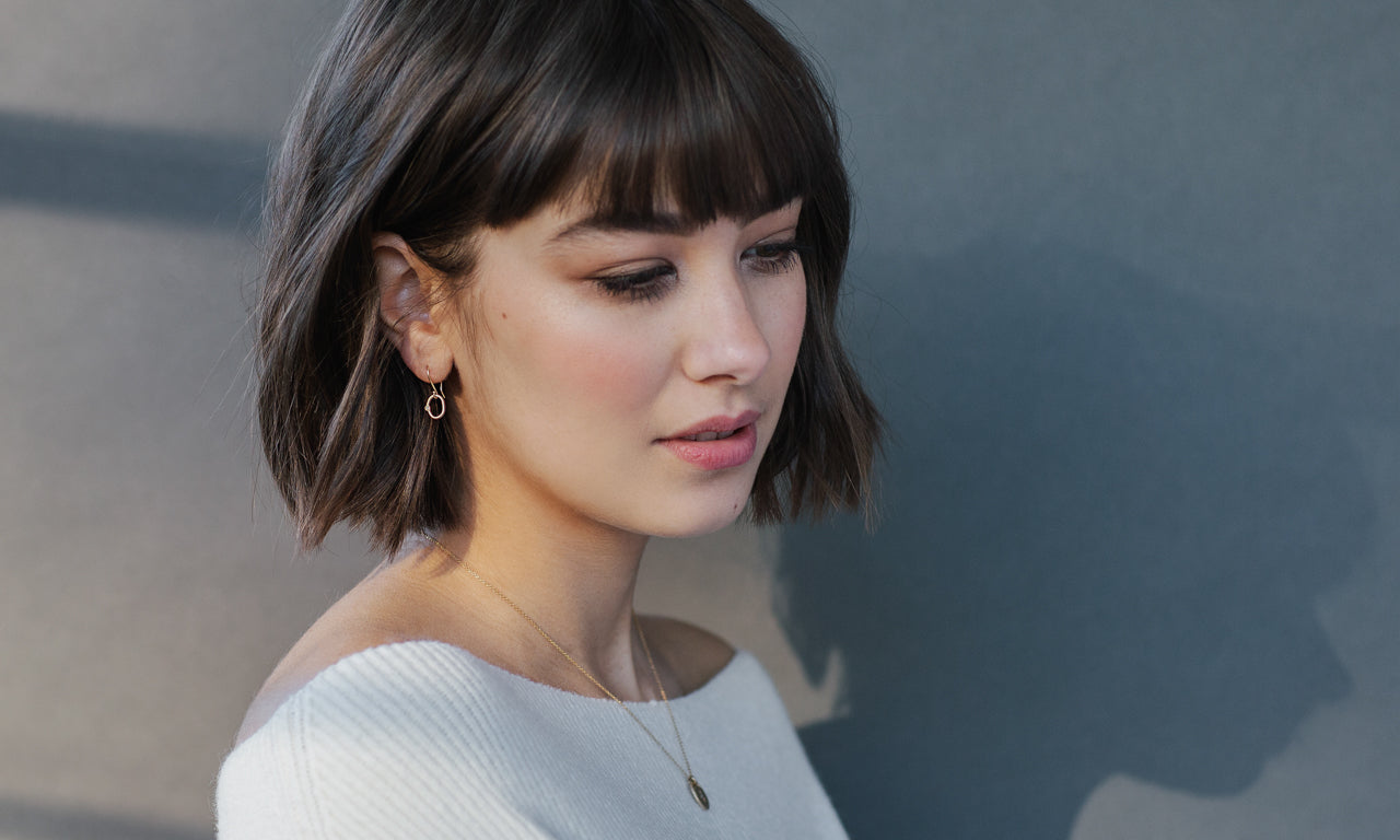 Bead-set Black Spinel Dangle Earrings in Yellow Gold