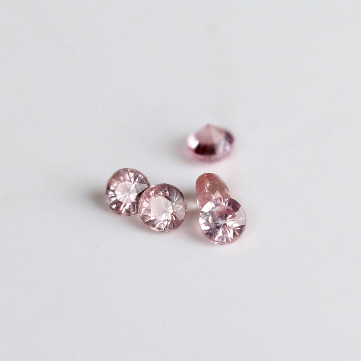 1.1mm Round Pink Peach African Sapphires - N10811