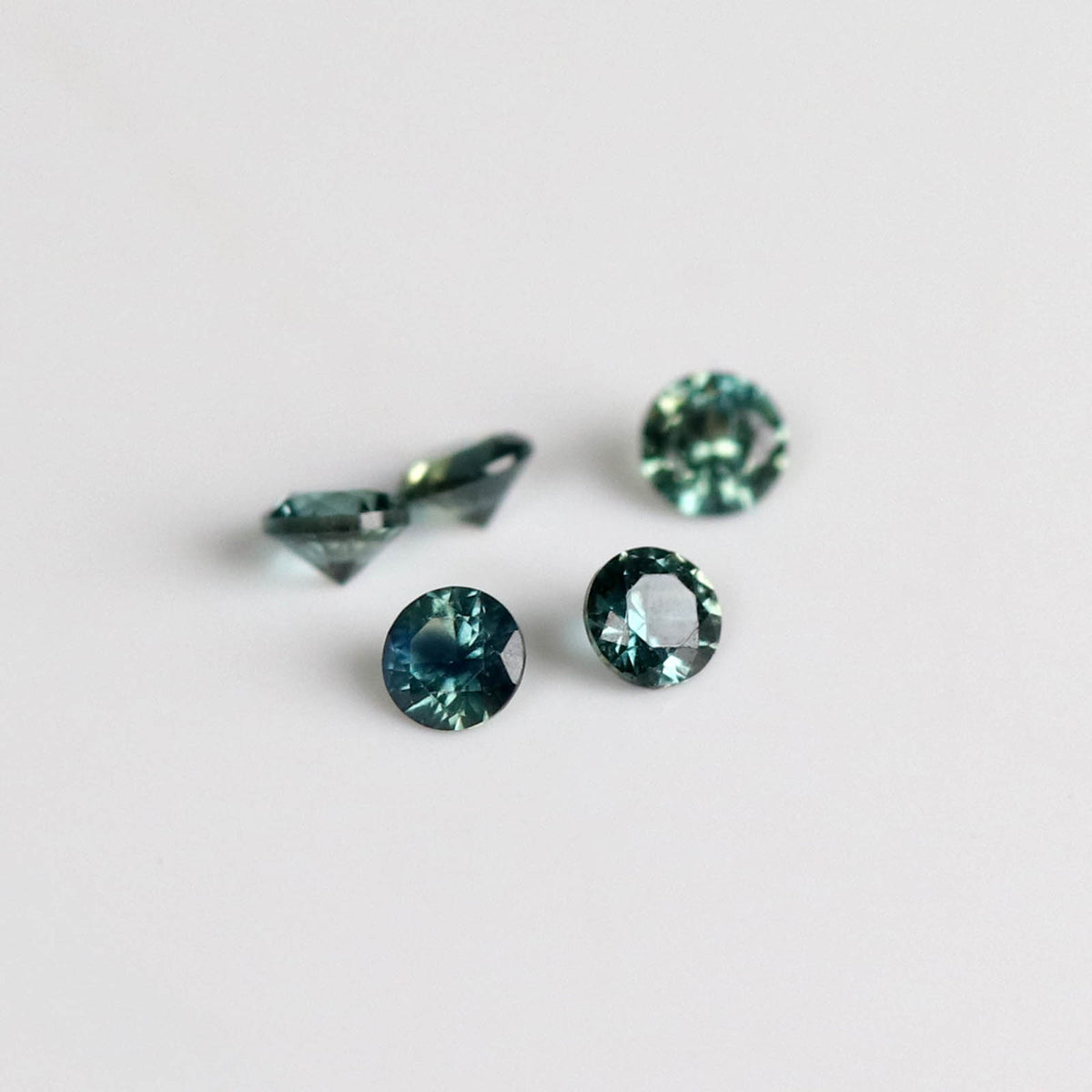 1.3mm Round Teal Australian Sapphires - N10613