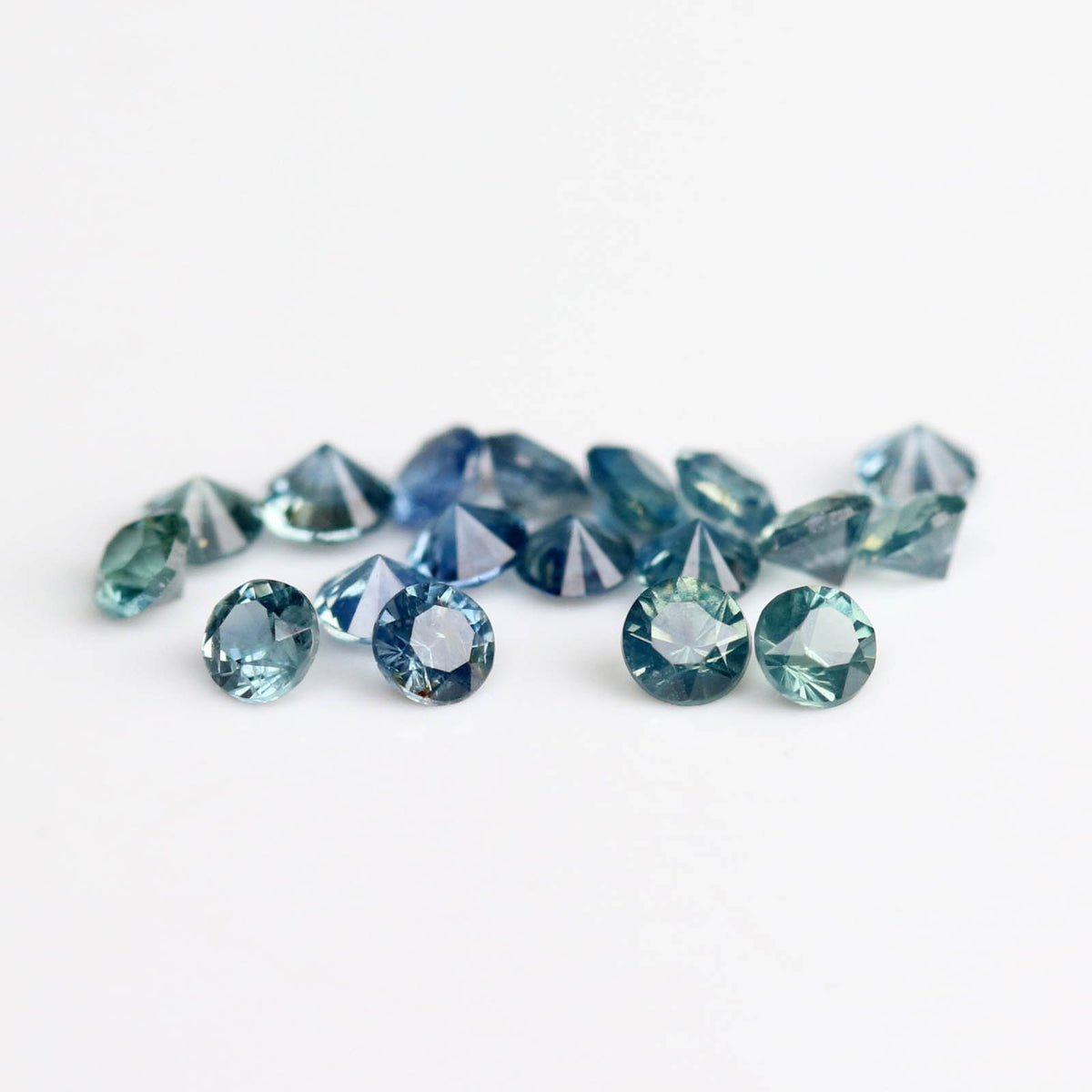 1.5mm Round Teal Australian Sapphires - 115415