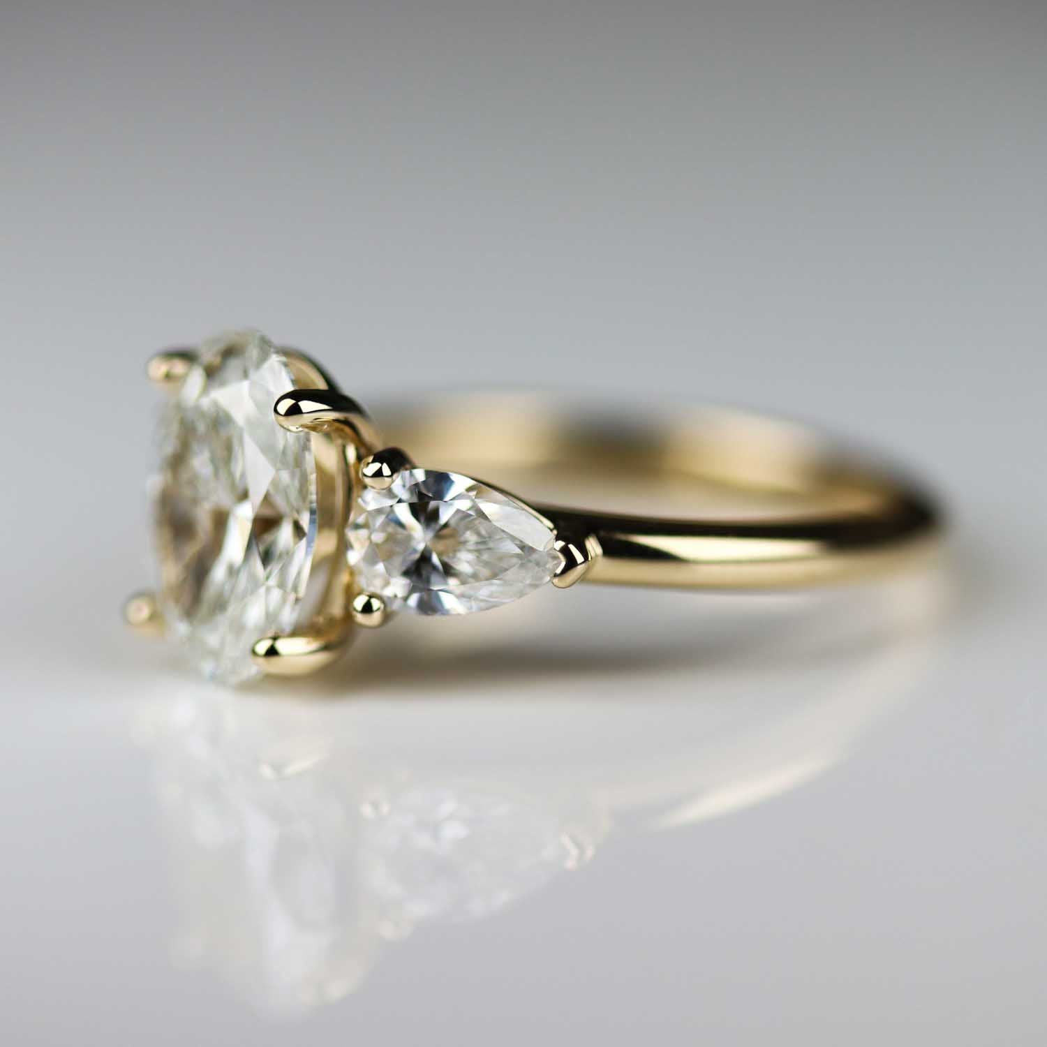 Three Stone Basket Engagement Ring