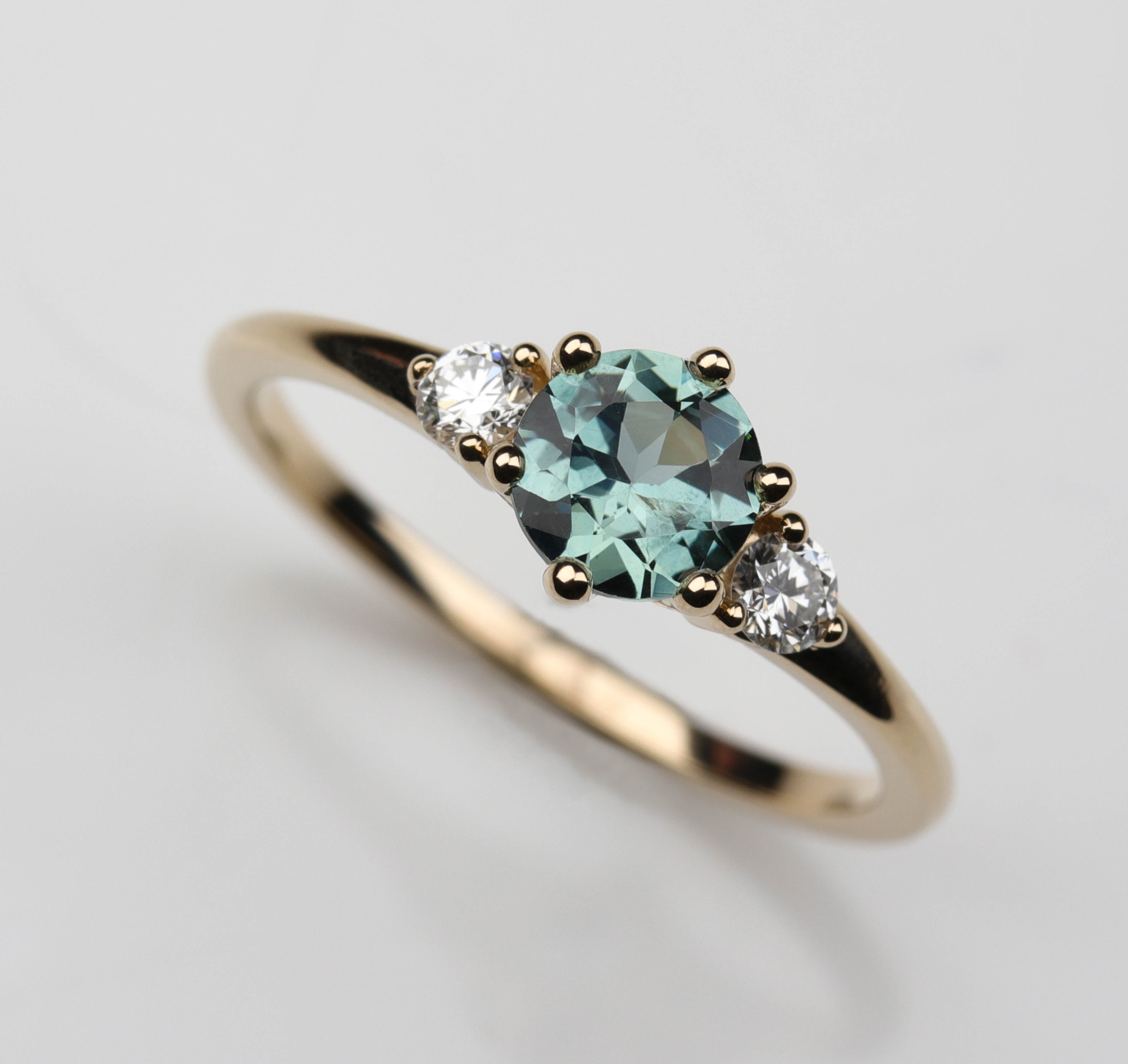 Three Stone Ring with Teal Malawi Sapphire