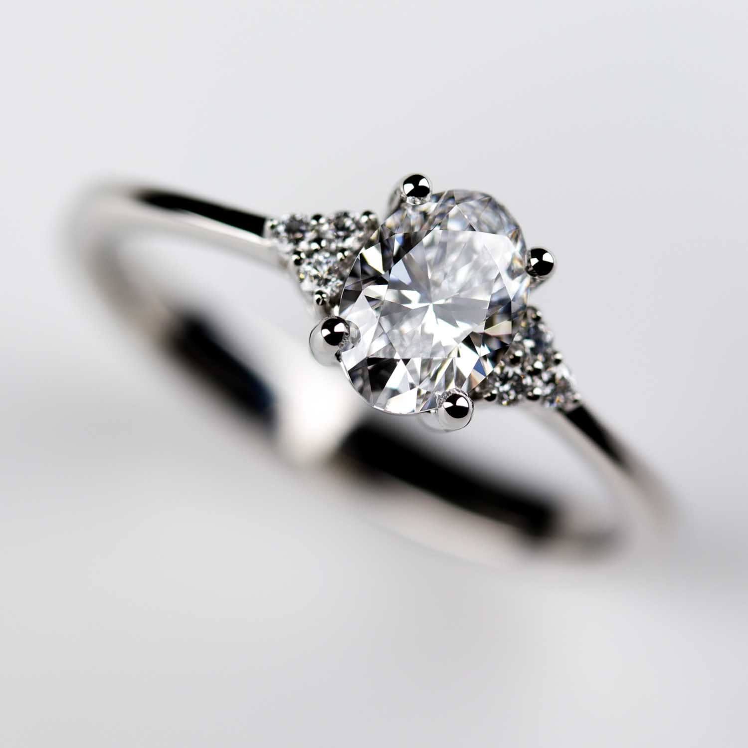 Oval-cut Seven Stone Cluster Engagement Ring