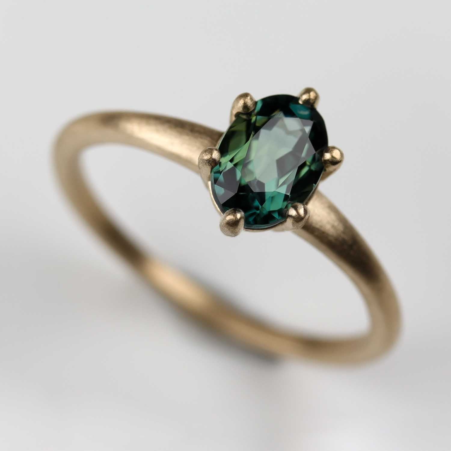 7x5mm Oval Australian Sapphire Six-Prong Solitaire Yellow Gold