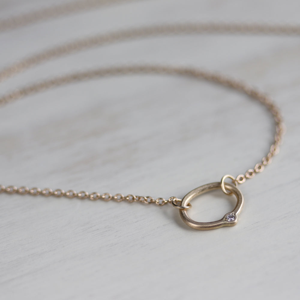 . Oval Bead-set Diamond Pendant