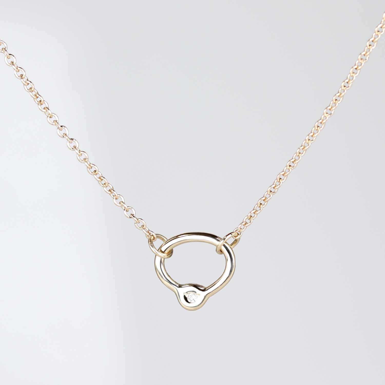 . Oval Bead-set Diamond Pendant