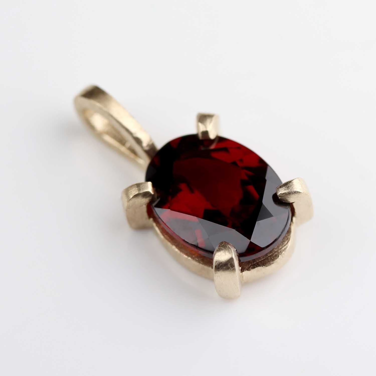 . Prong-set 14k Yellow Gold and Idaho Garnet