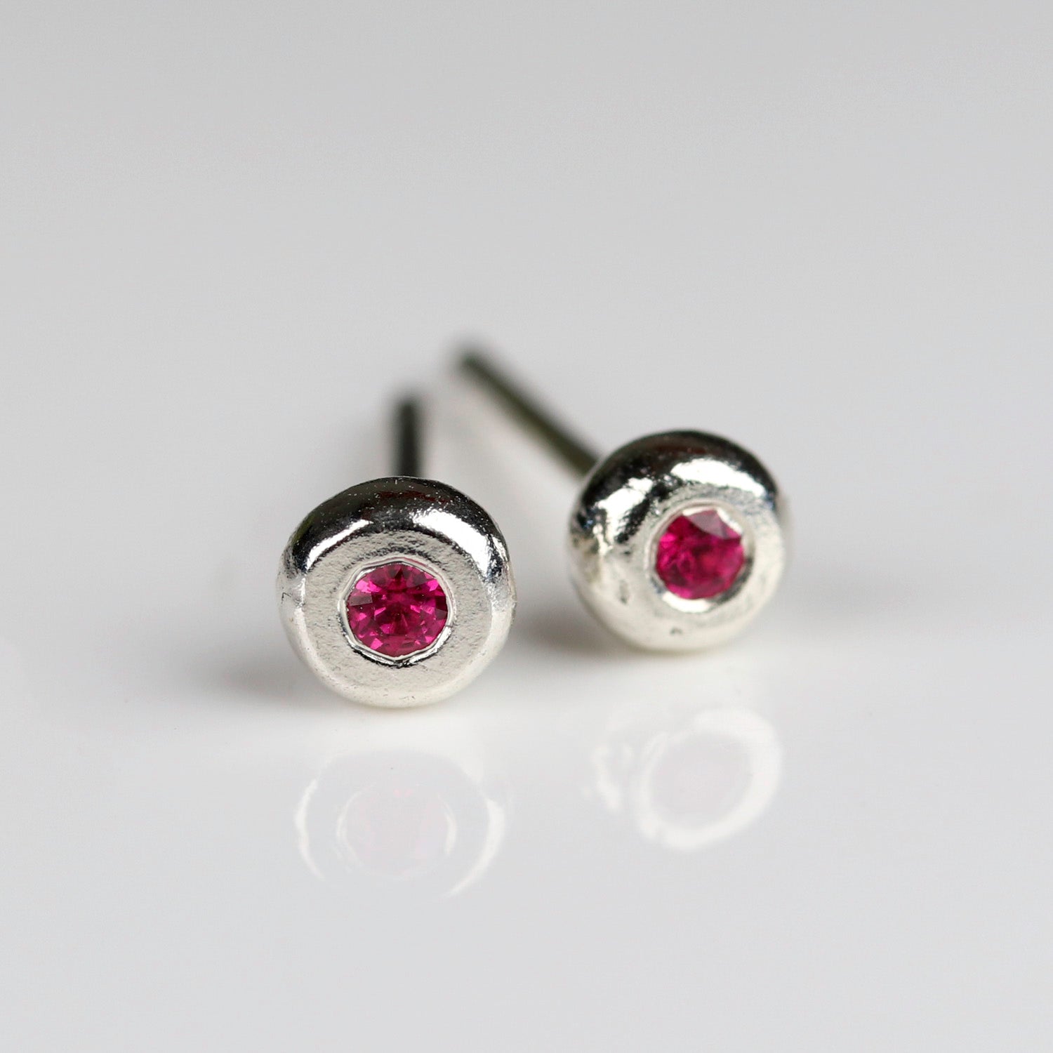 • Sterling Silver and Ruby Pebble Stud Earrings