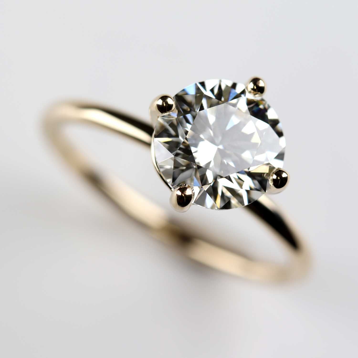 Compass Set Solitaire with Heirloom Stone