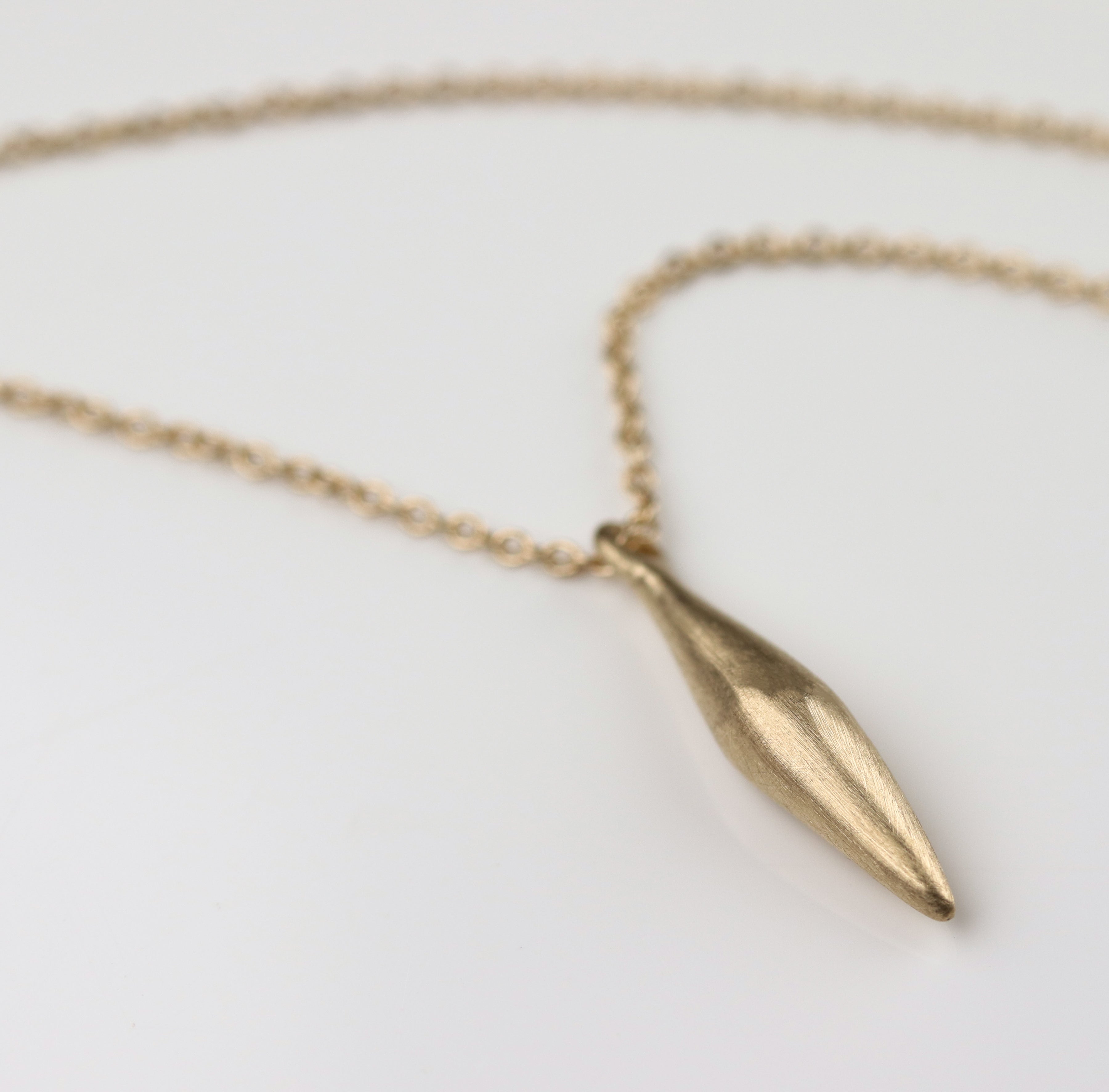 . Vertical Sculpted Pod Pendant