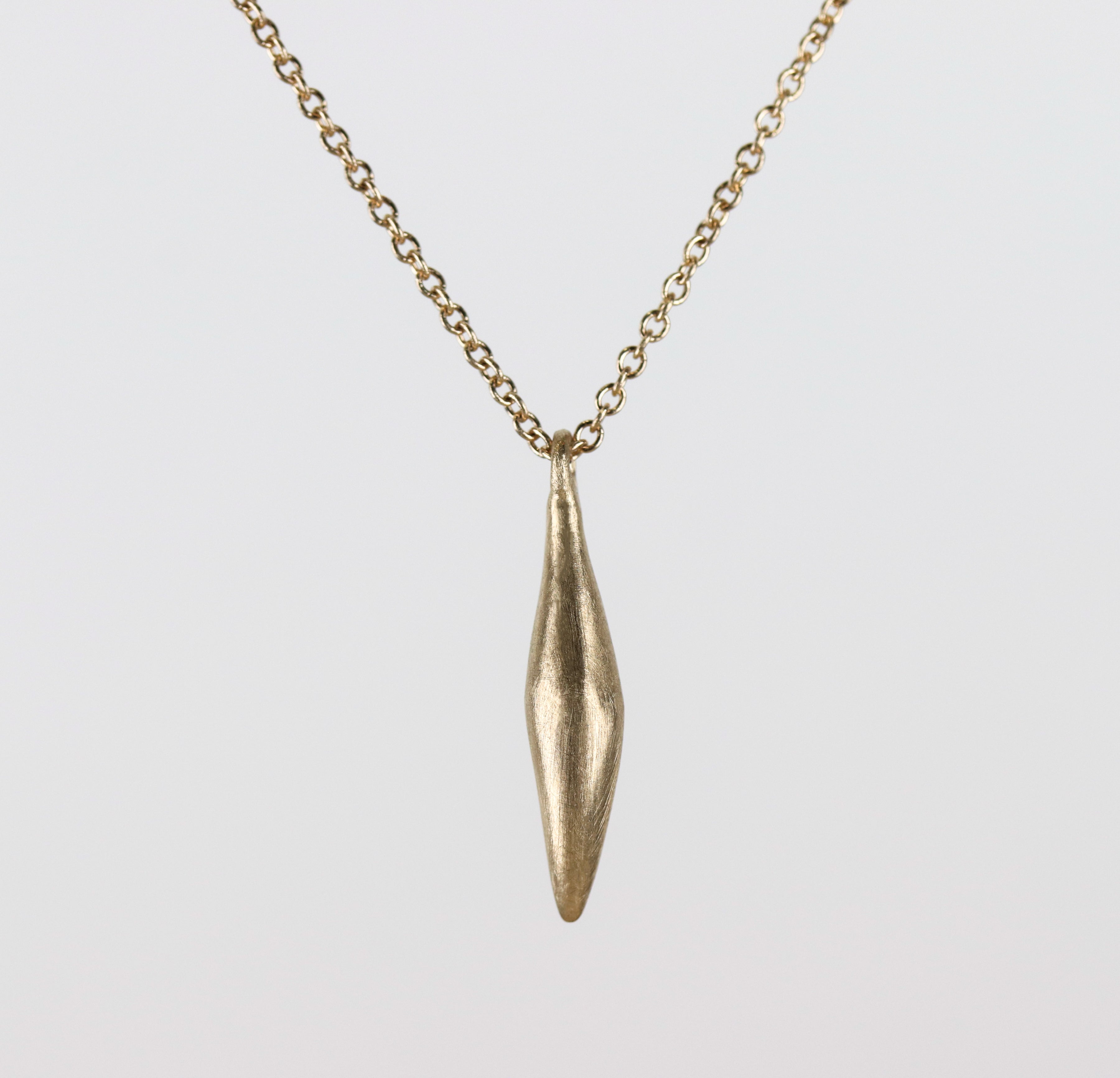 . Vertical Sculpted Pod Pendant