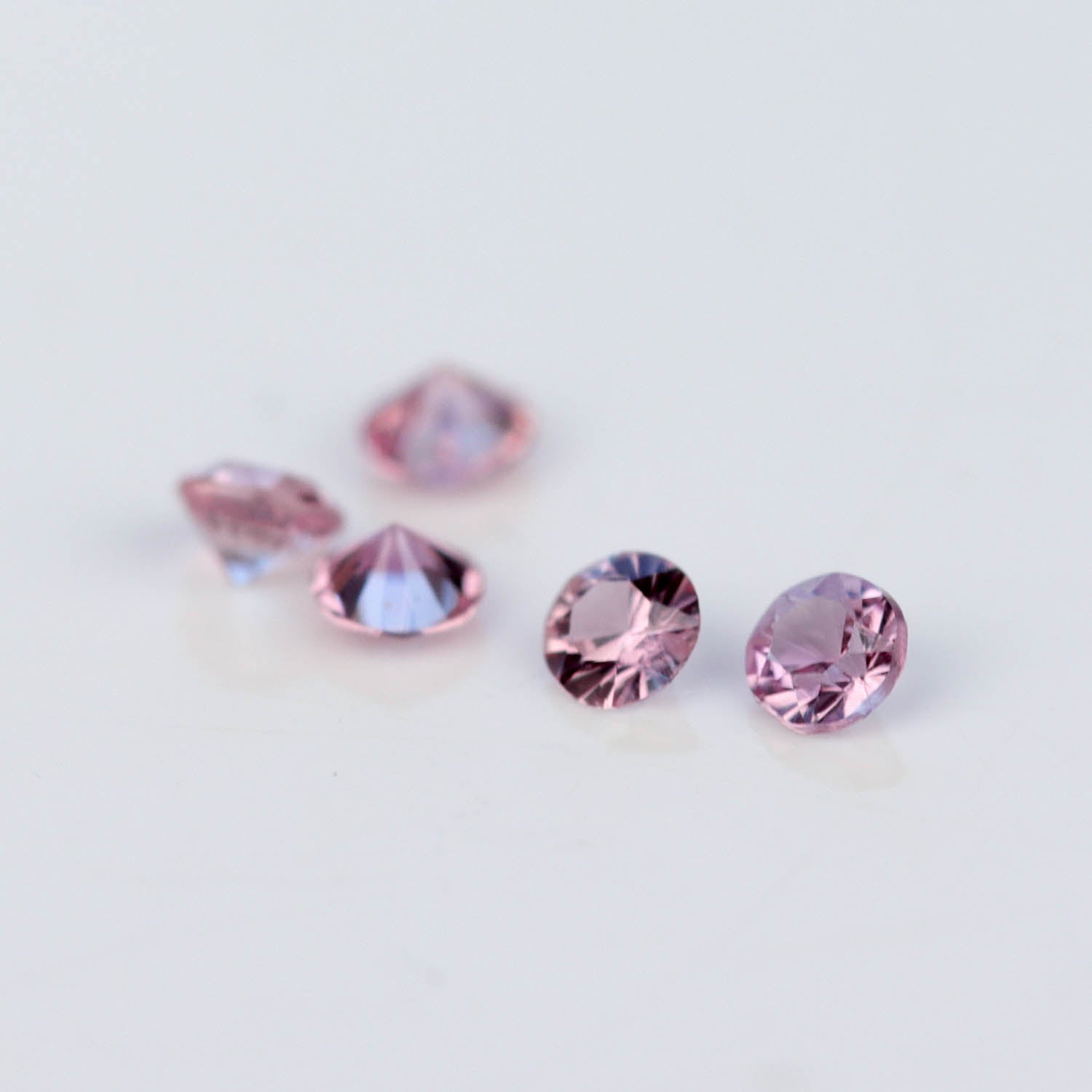 1.5mm Round Natural Padparadscha Sapphires - 102615