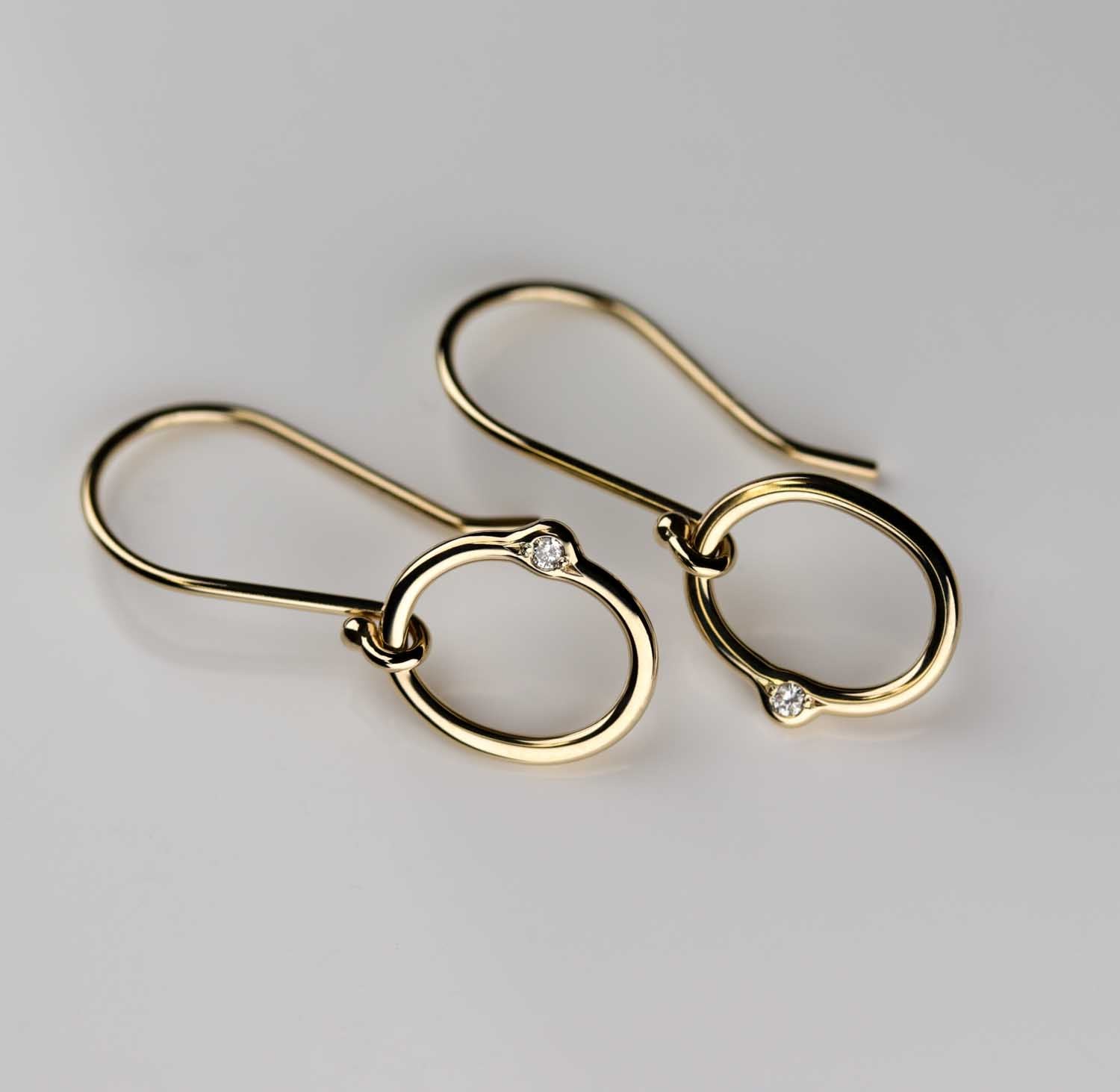 . Oval Bead-set Diamond Dangle Earrings