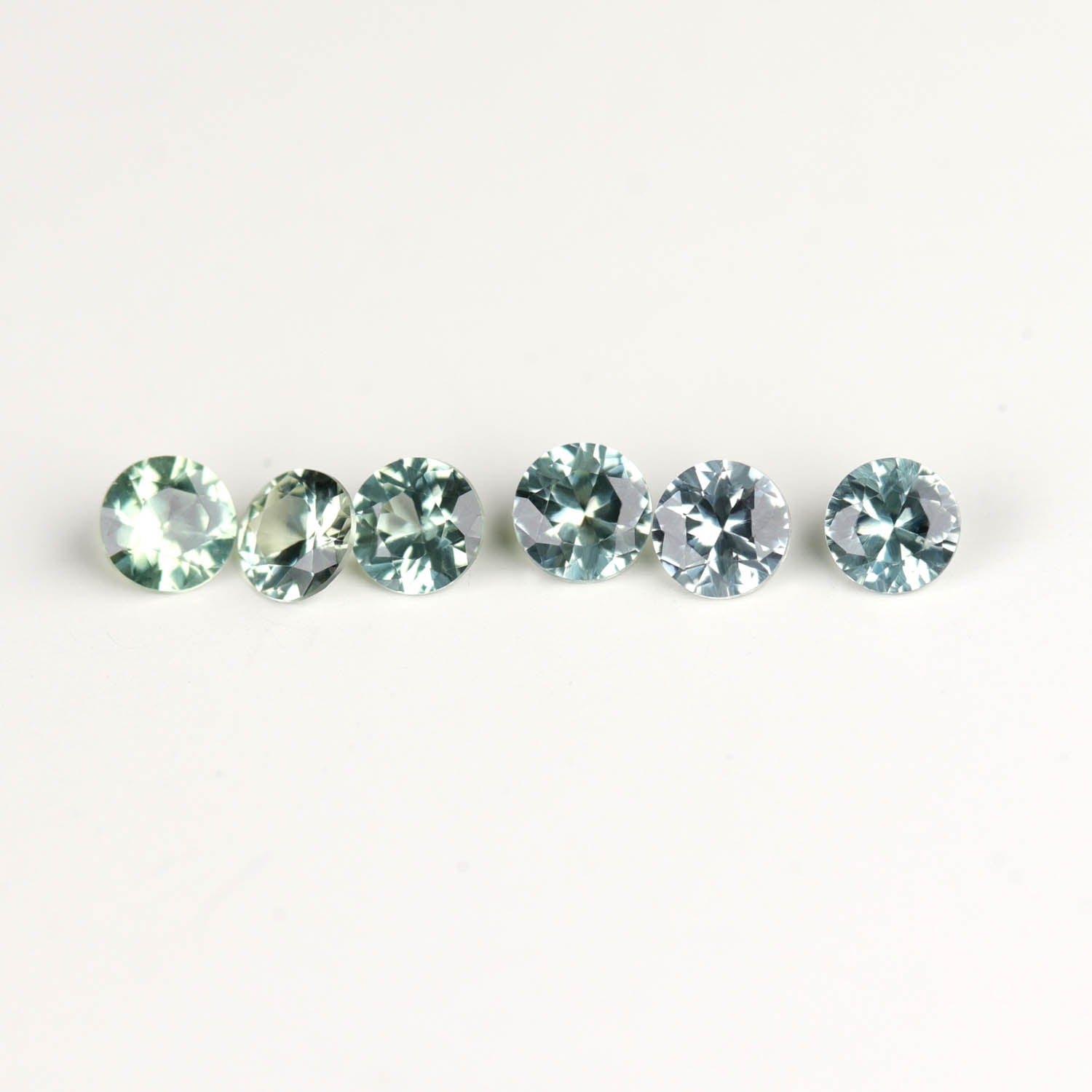 2.5mm Celery Green Round Montana Sapphires - 114725