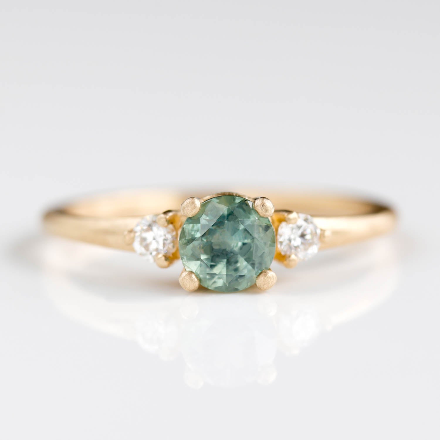 5mm Prong-set Three Stone Ring with Montana Sapphire