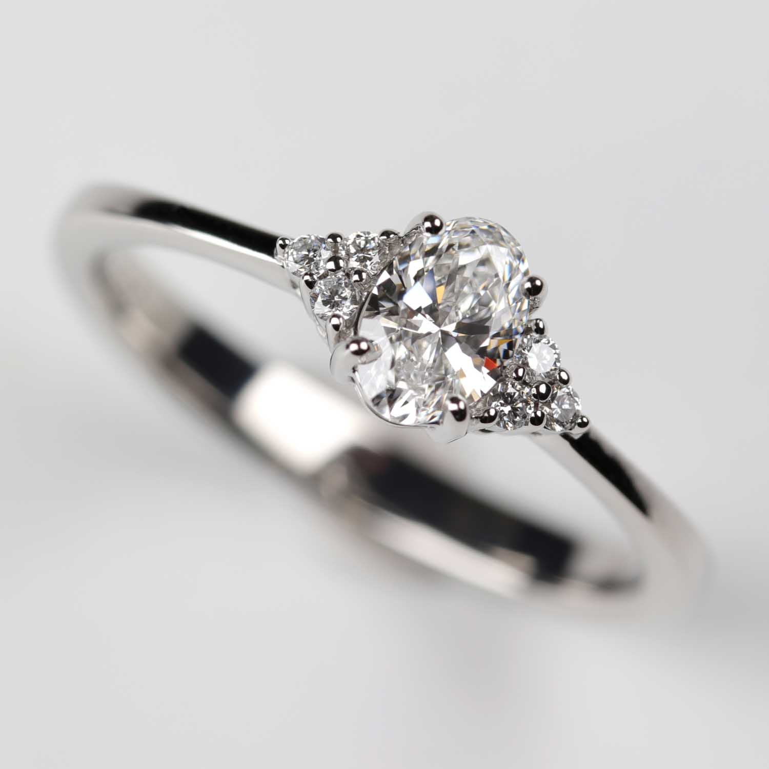 Oval-cut Seven Stone Cluster Engagement Ring