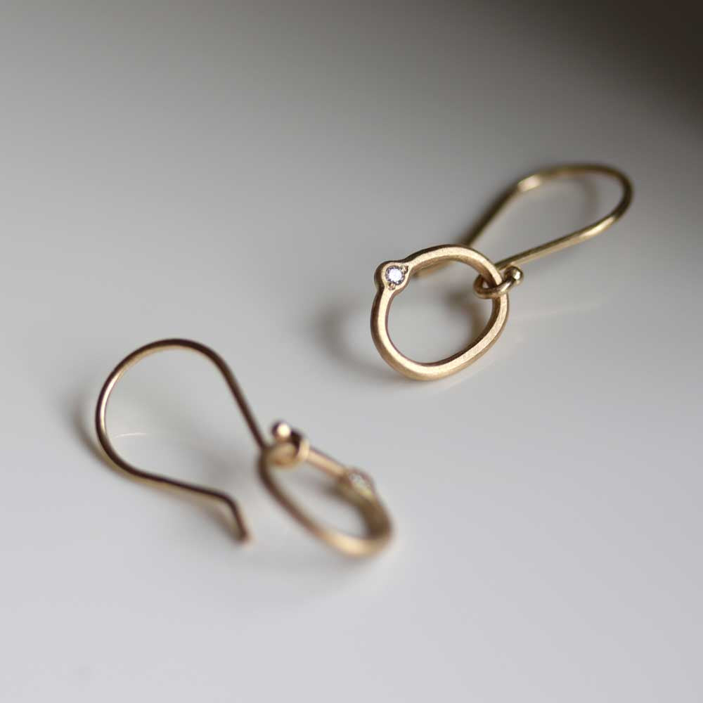 . Oval Bead-set Diamond Dangle Earrings