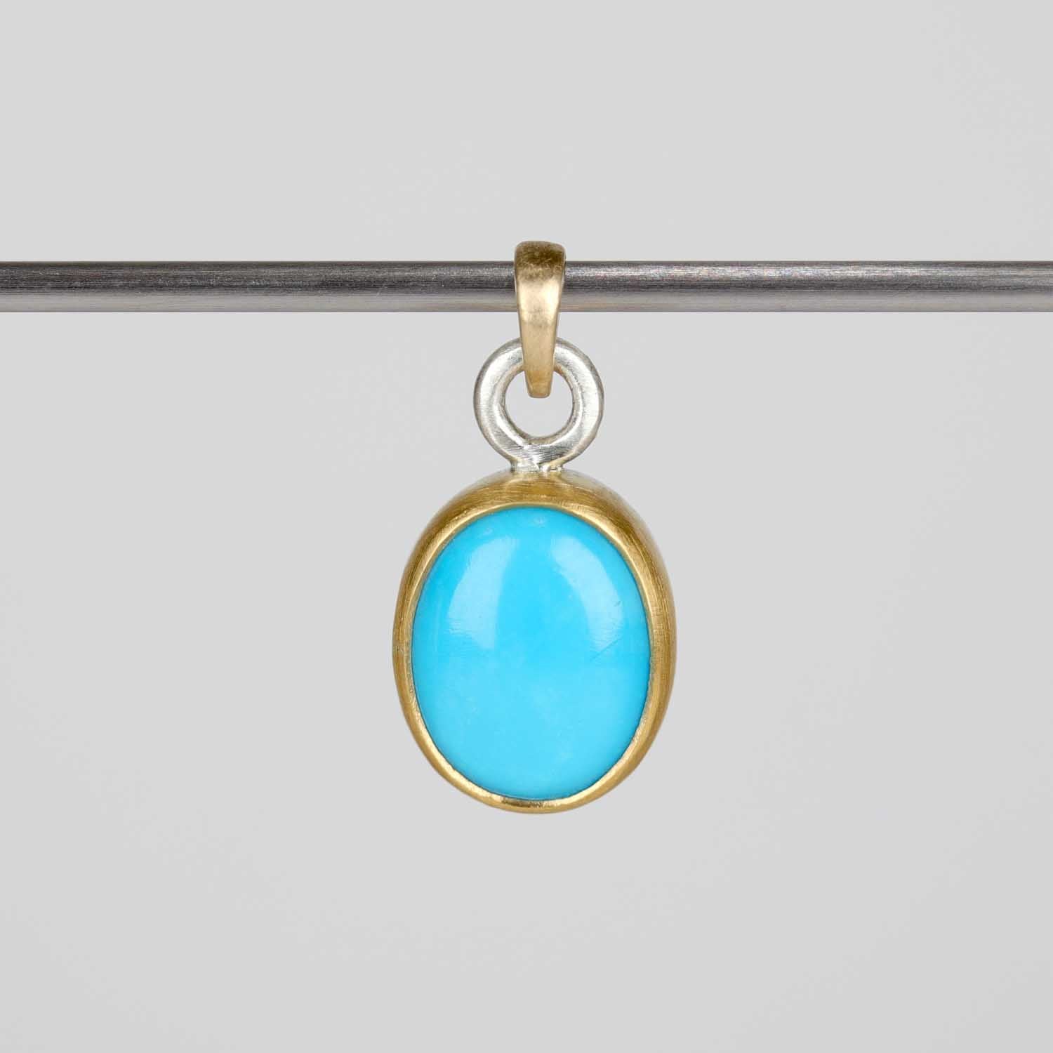 . Bezel-set Arizona Turquoise Set in Gold & Silver