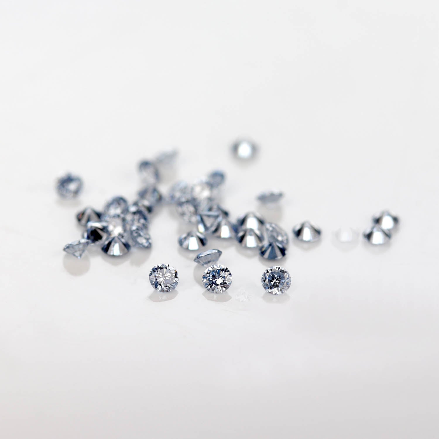 . 1.3-2mm Round Lab-grown Blue Diamond
