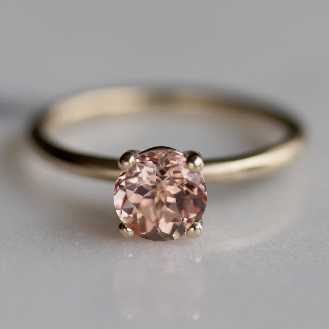 . Lab-grown Peach Champagne Sapphire