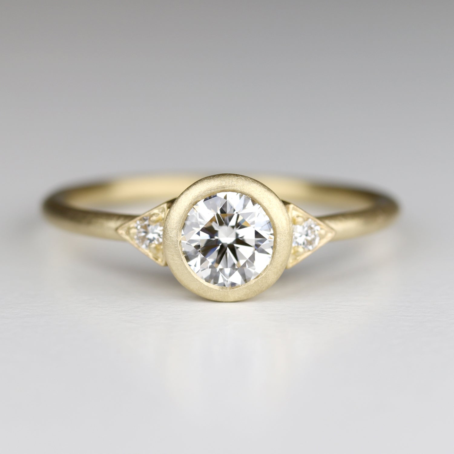Deco Bezel Three Stone Ring with Diamond Foundry Stone