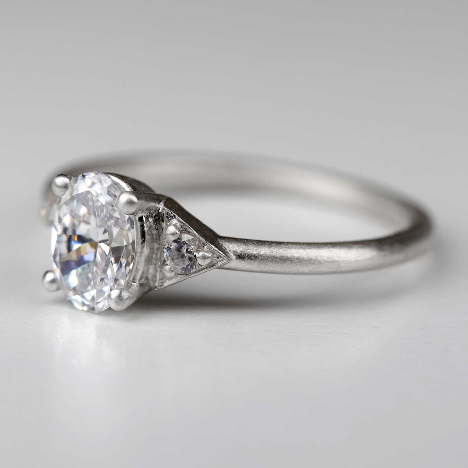 7x5mm Prong-set Deco Three Stone Ring •