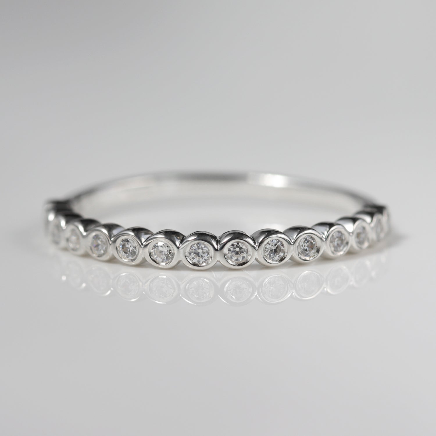 Bezel Set Half Eternity Band