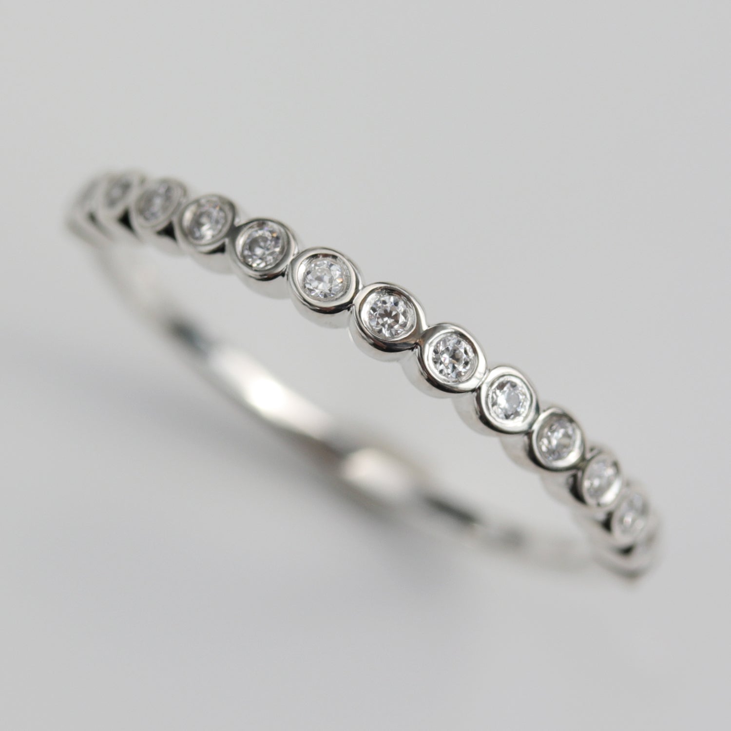 Bezel Set Half Eternity Band