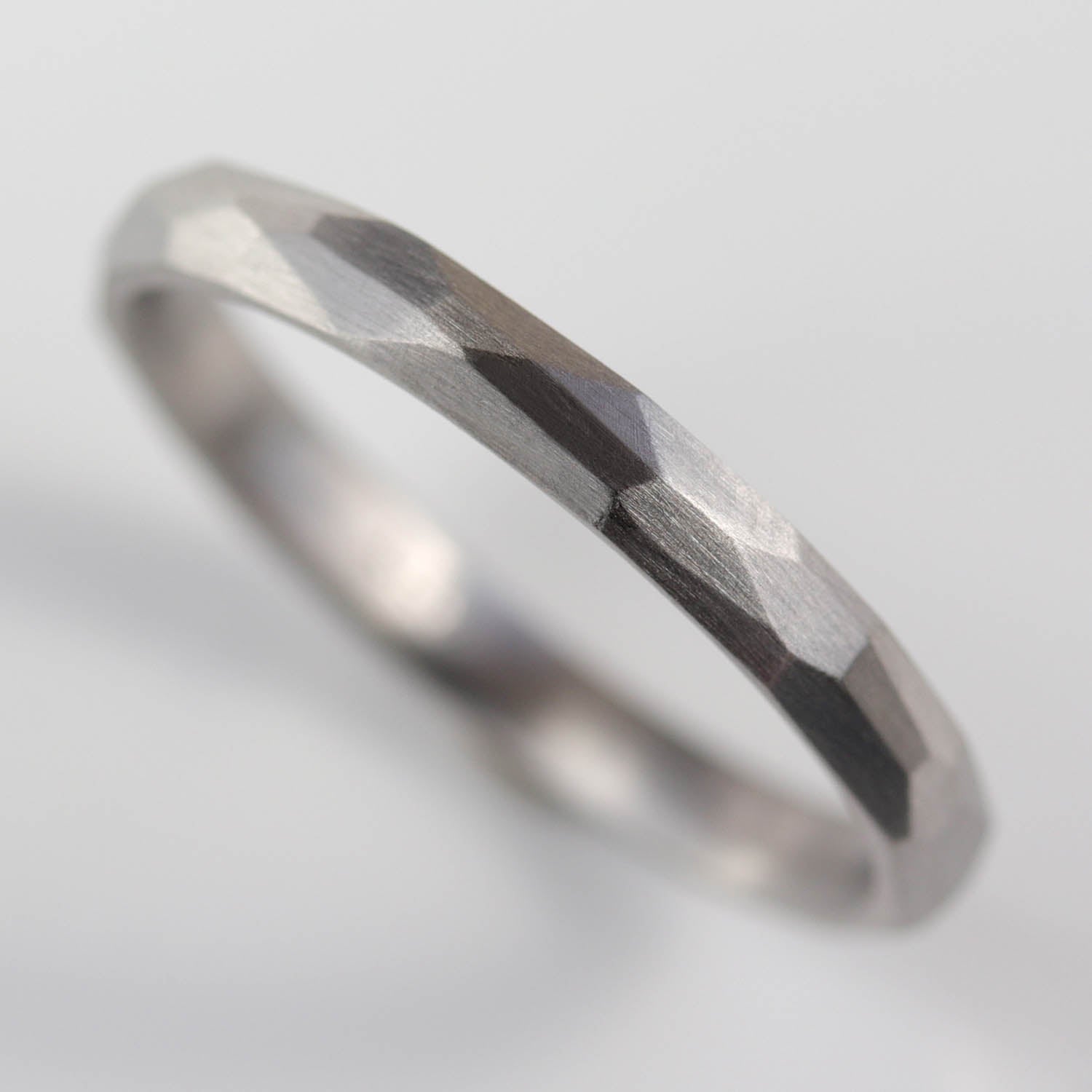 Narrow Faceted Wedding Band •