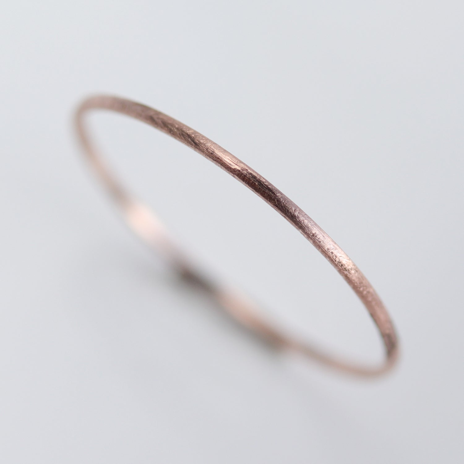 14k Rose Gold .8mm Rustic Round Ring