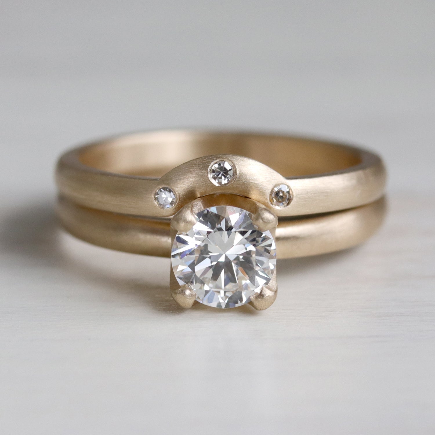 Three Stone Half-circle Contour Band •