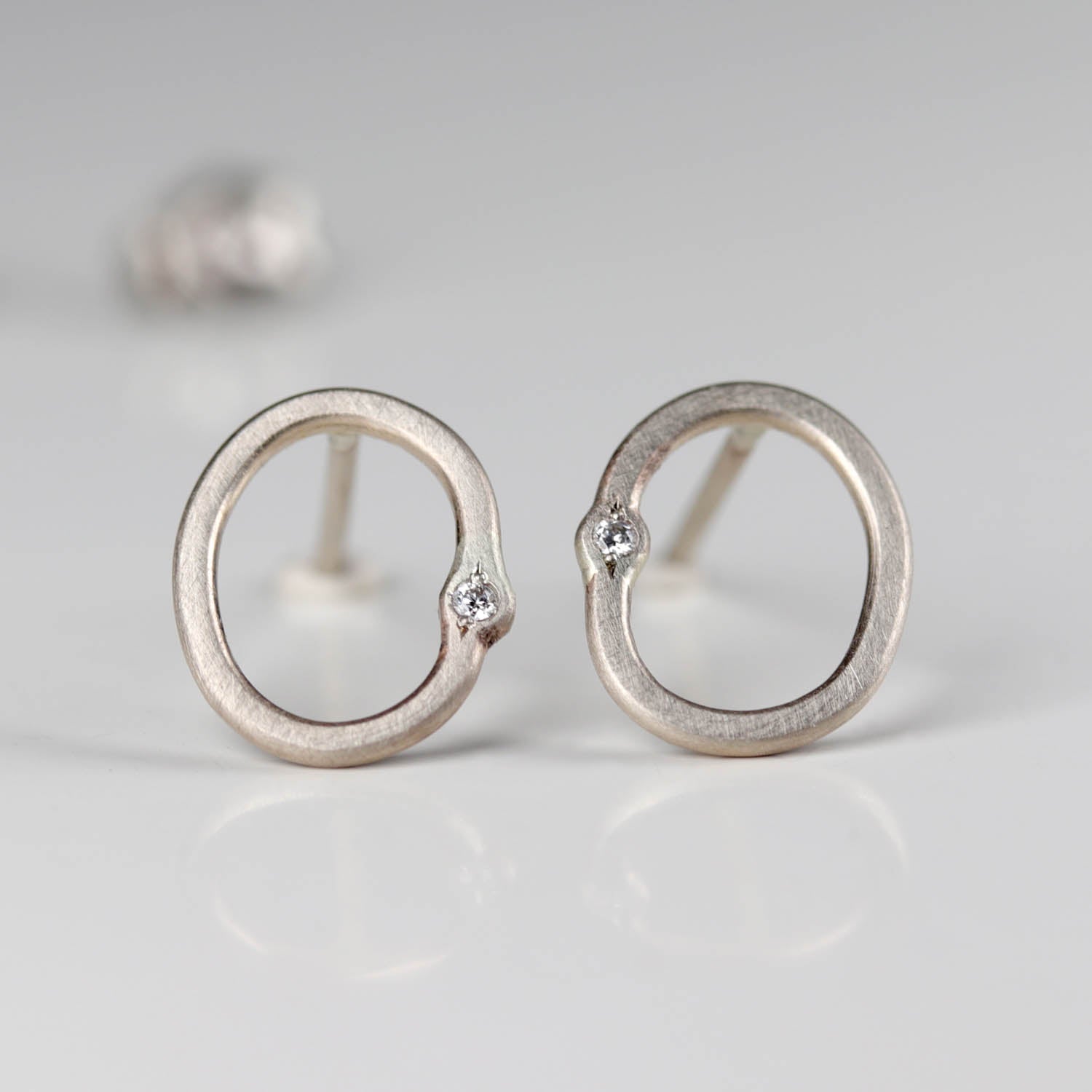 . Oval Bead-set Diamond Stud Earrings