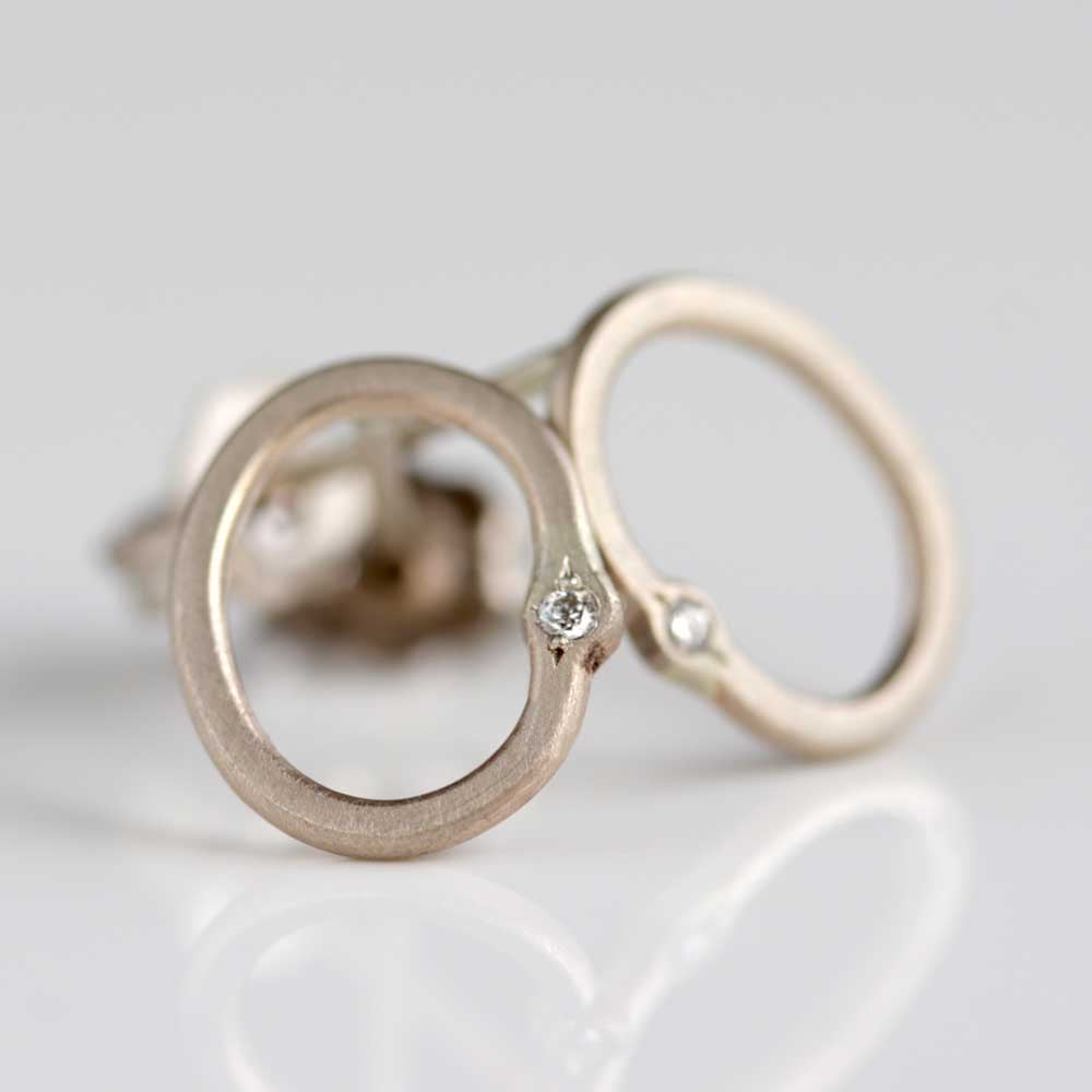 Oval Bead-set Diamond Stud Earrings