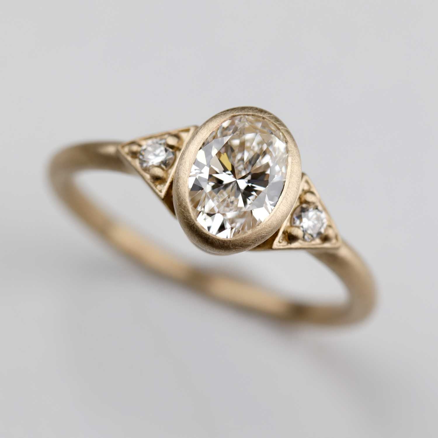 7x5mm Oval Deco Three Stone Ring