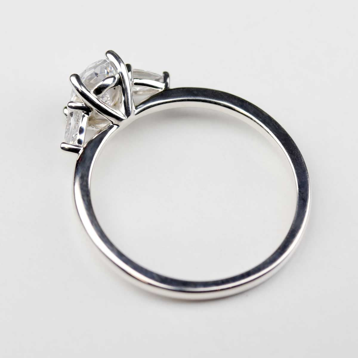 Three Stone Basket Engagement Ring