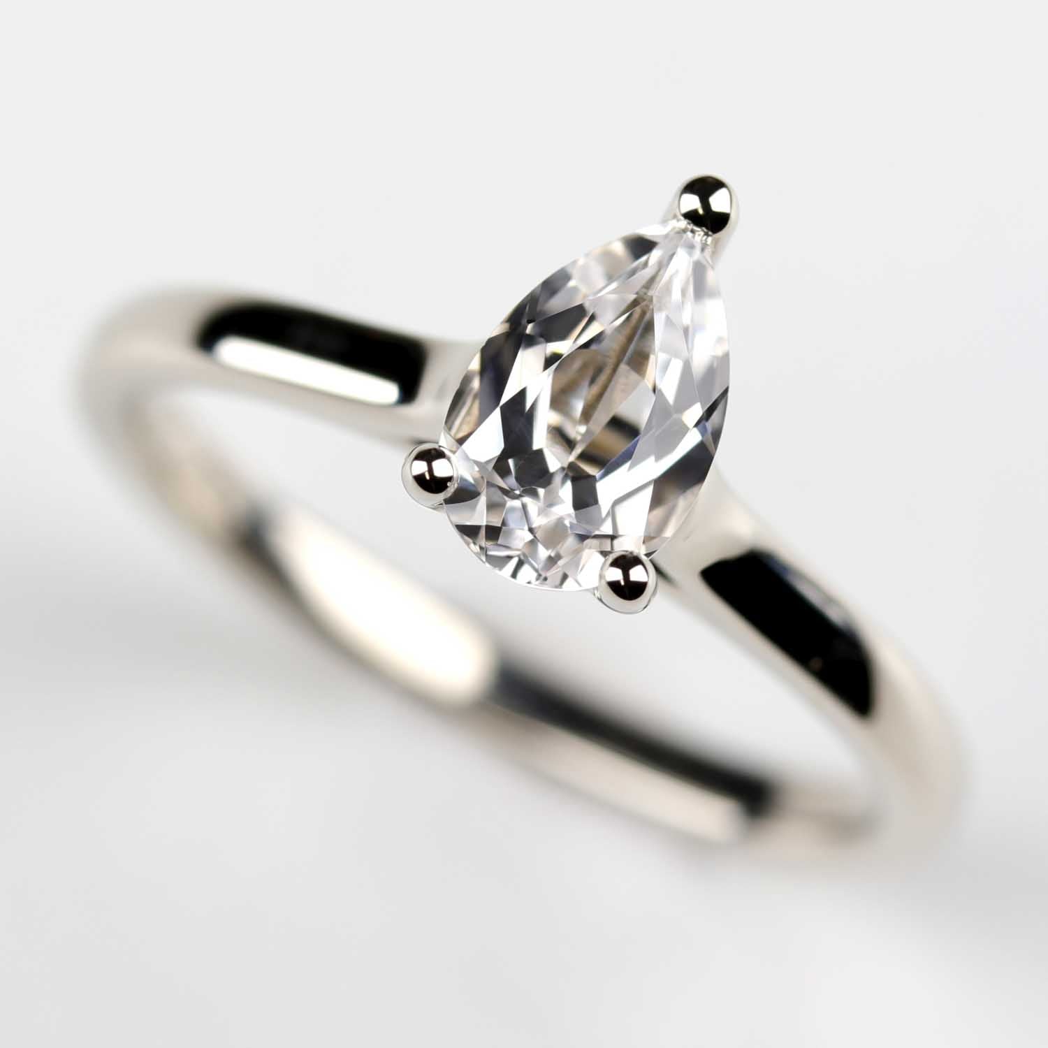 Pear Cut Lab-grown White Sapphire Cathedral Solitaire