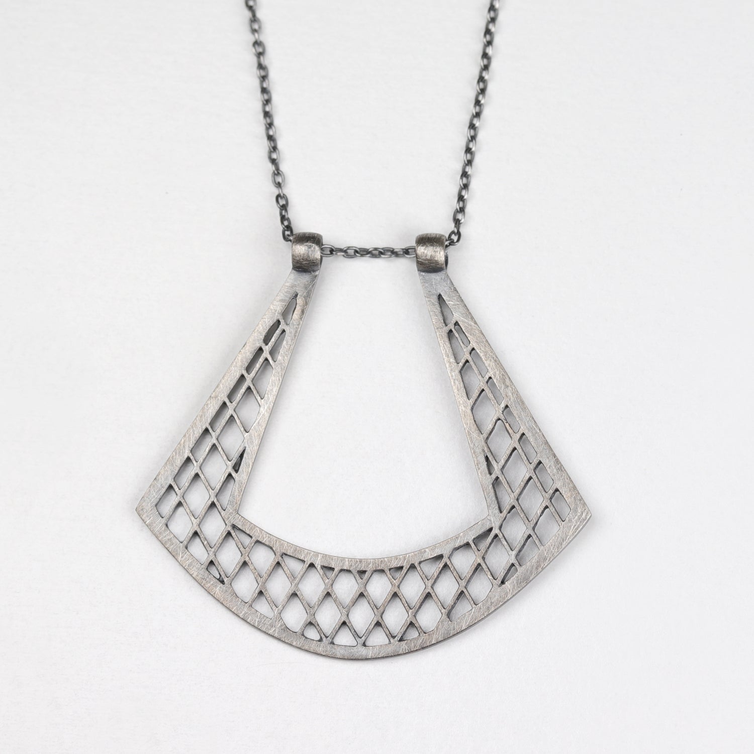 . Darkened Silver Pierced Magic Ring Holder Necklace