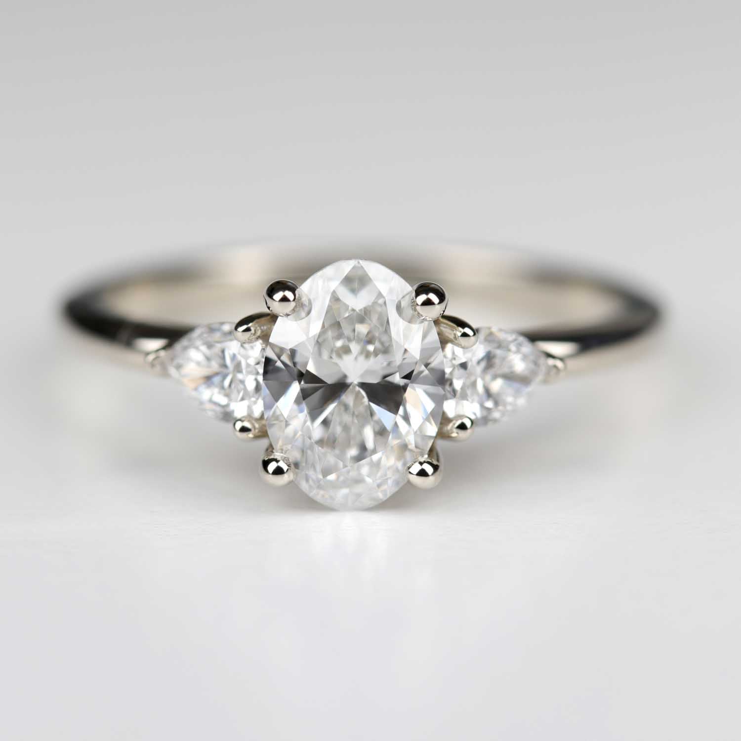 Three Stone Basket Engagement Ring