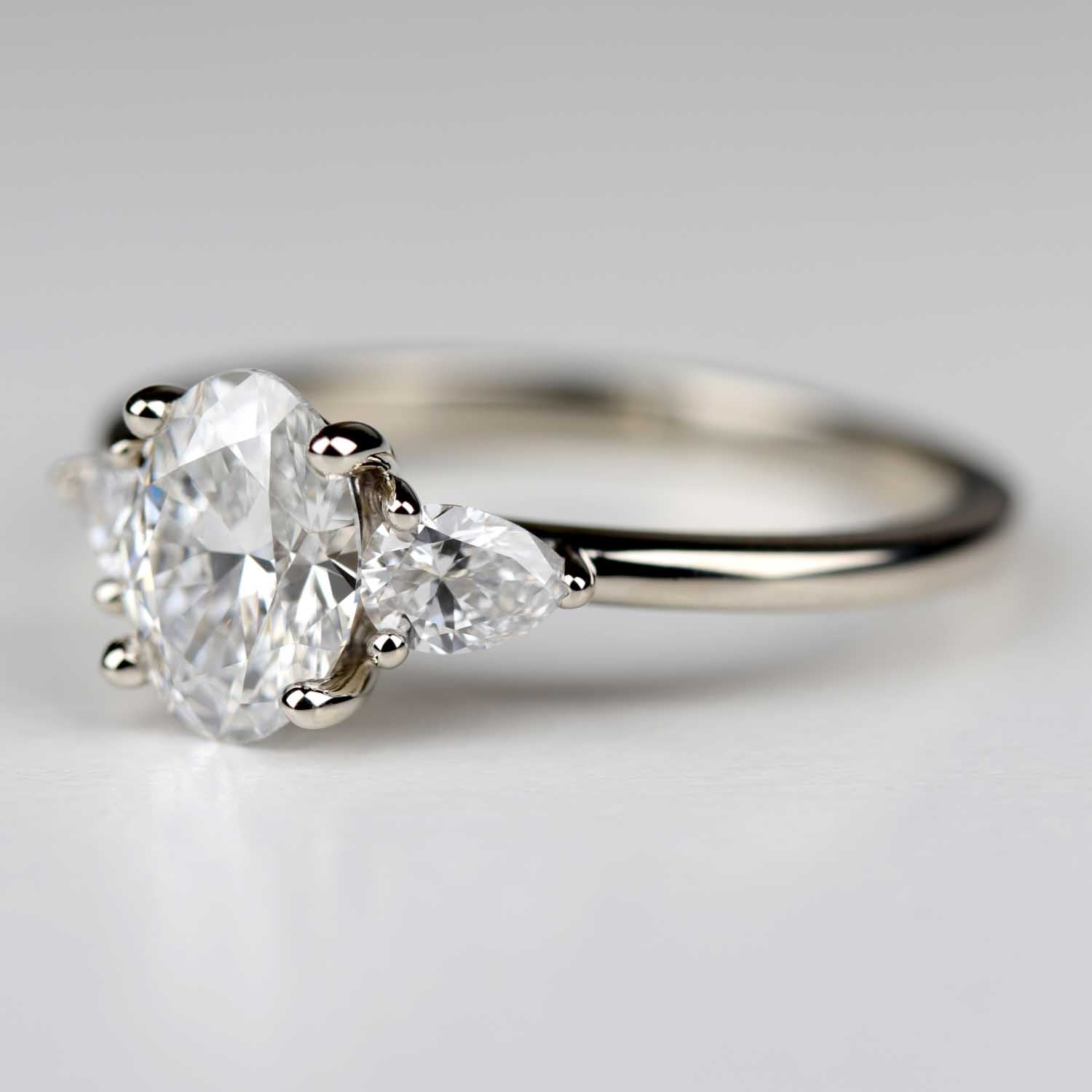 Three Stone Basket Engagement Ring