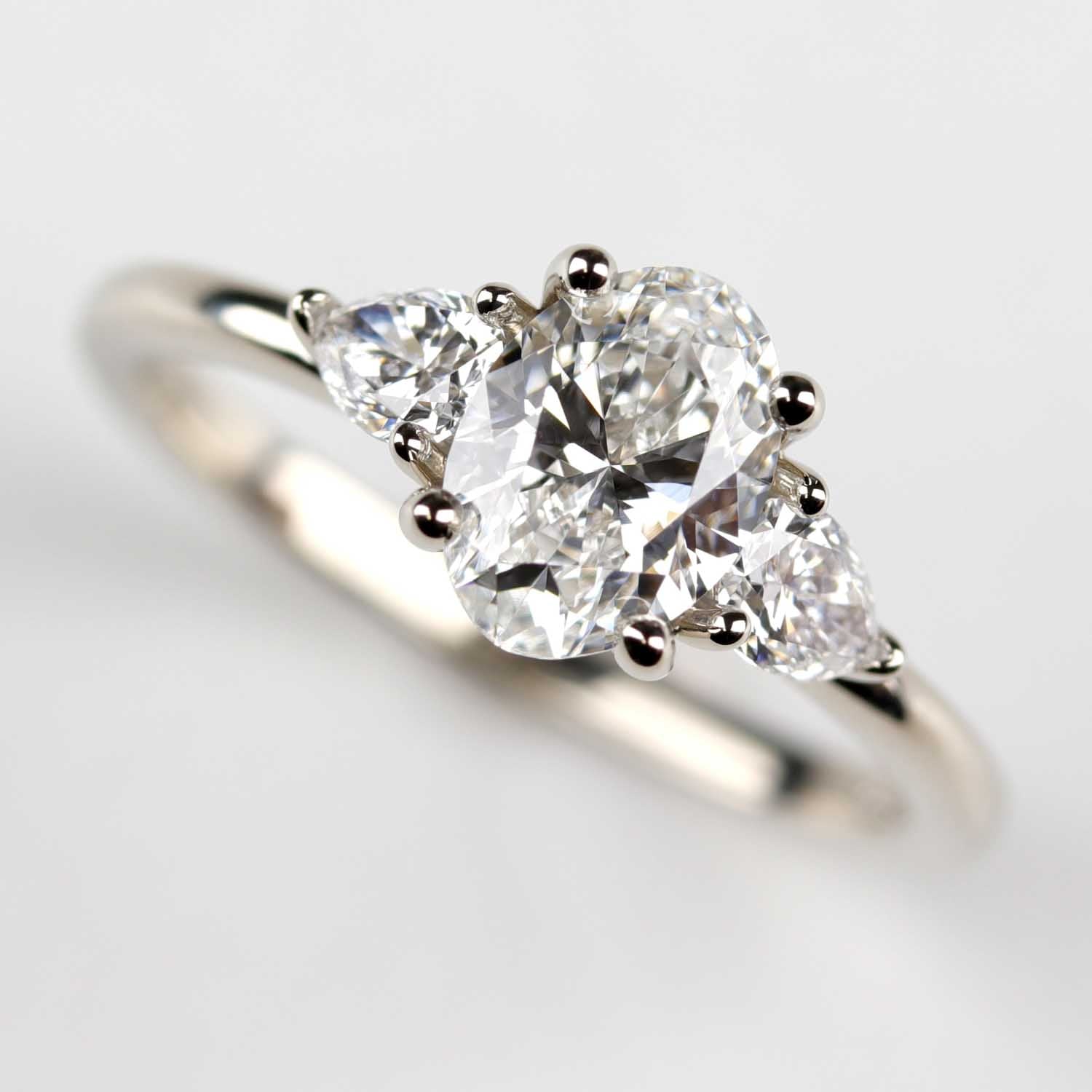 Three Stone Basket Engagement Ring