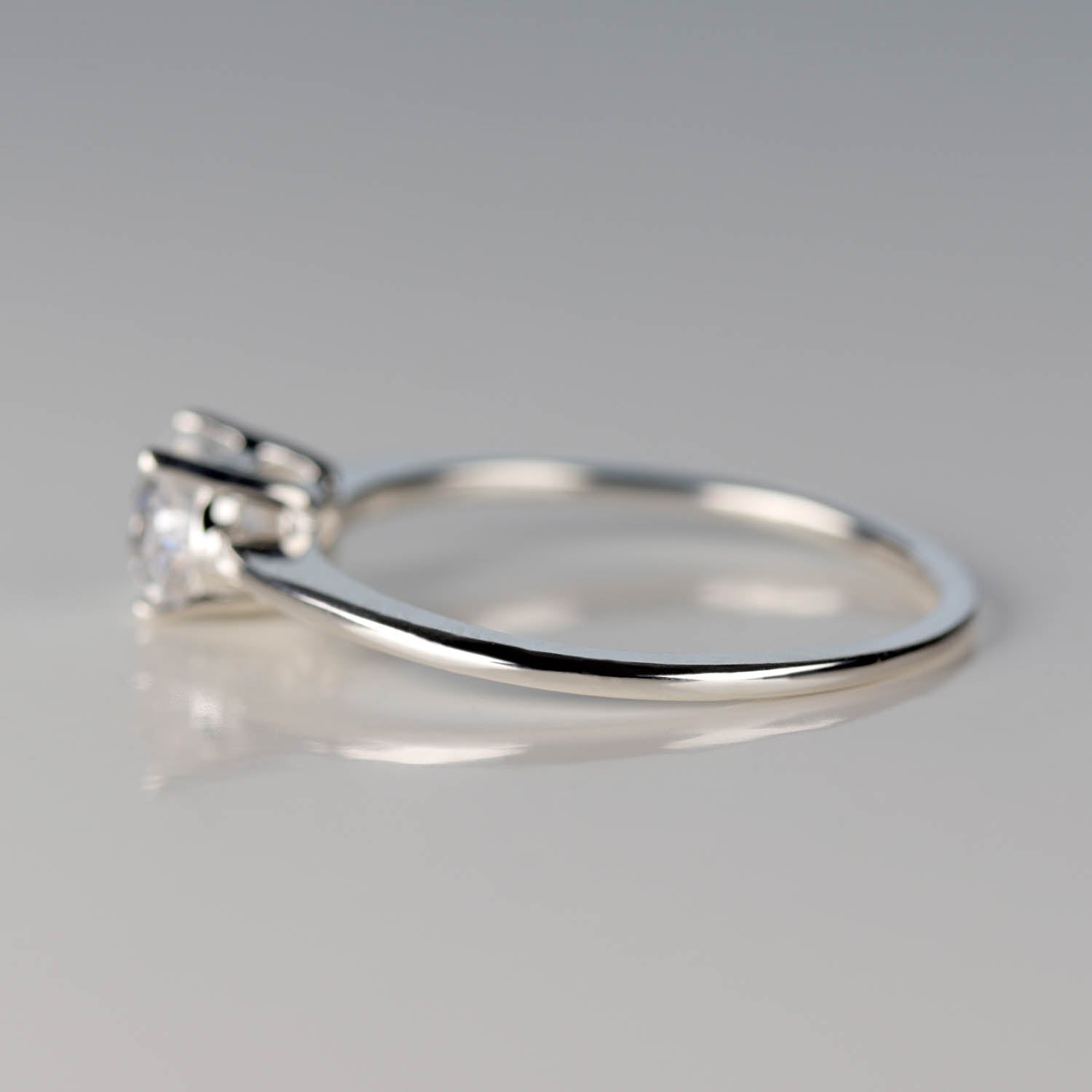 Oval Cut East-West Basket Solitaire Engagement Ring