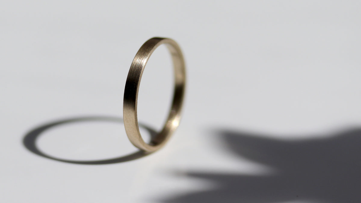 Thin band square outlet engagement ring