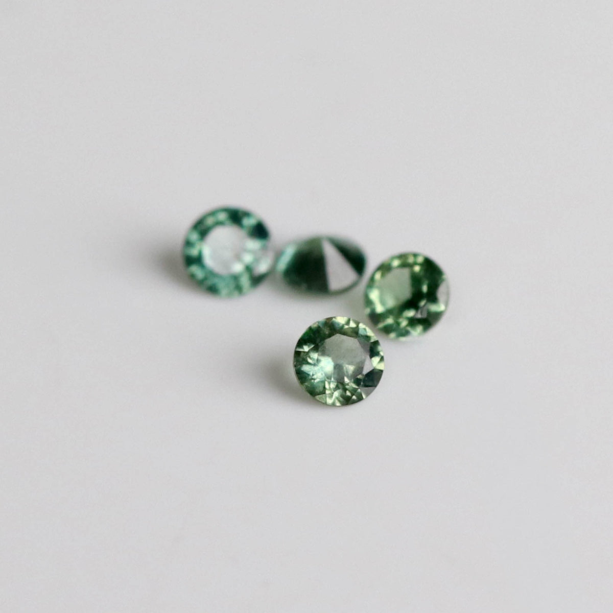 1.3mm Round Olive Green Australian Sapphires - N10513