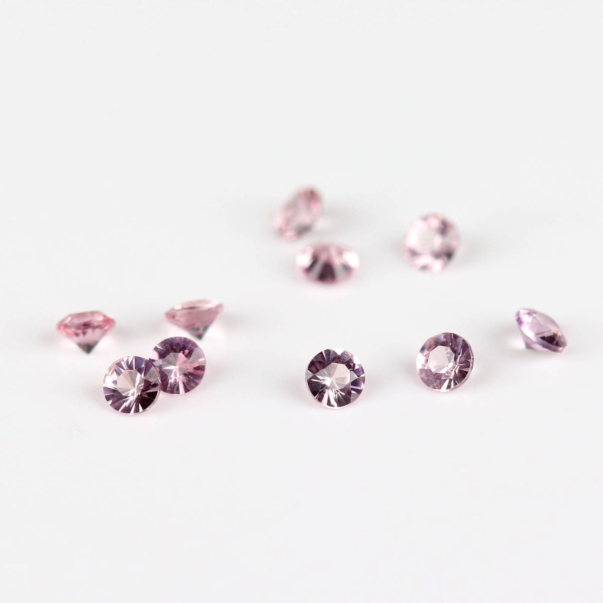 1.5mm Round Pink Peach African Sapphires - N10015