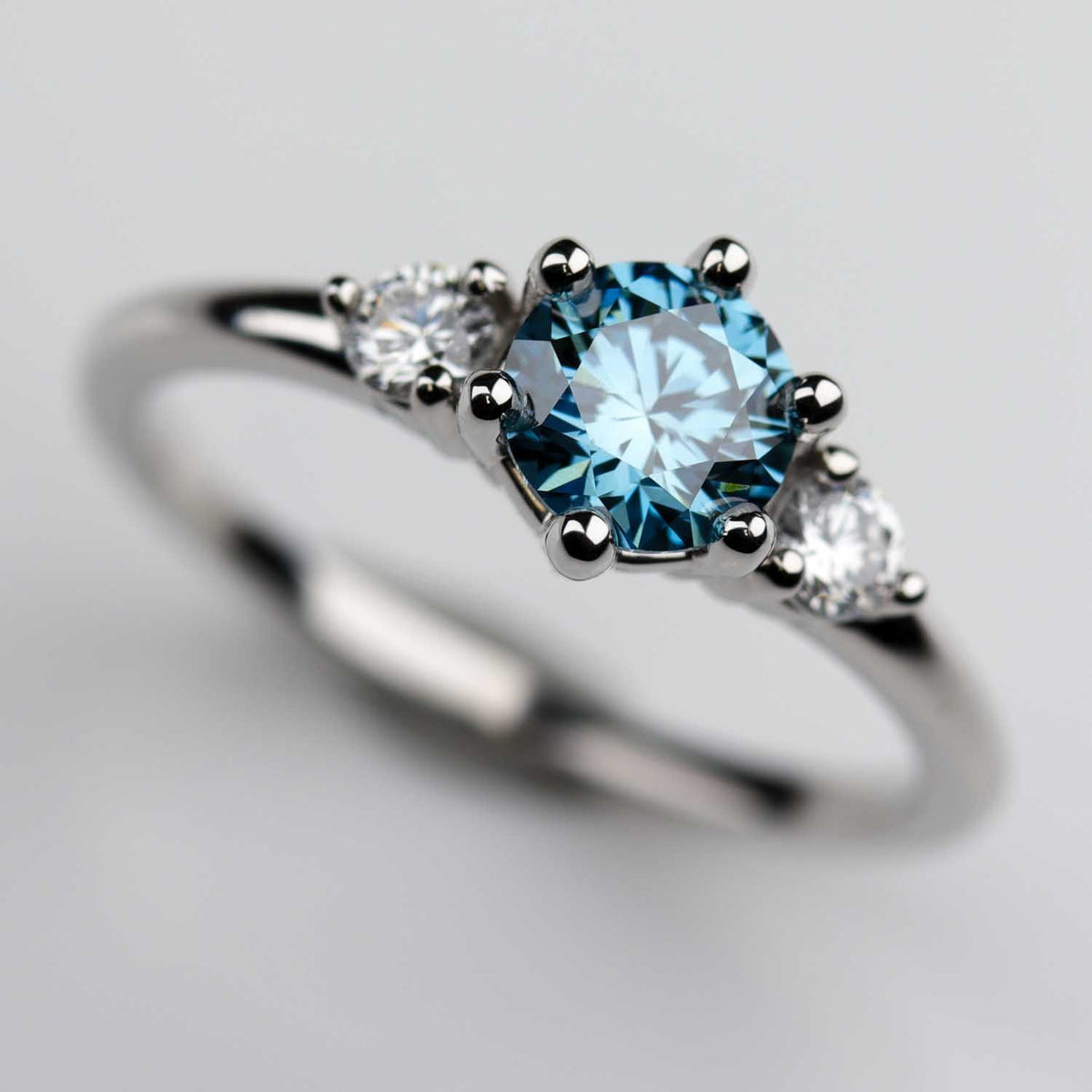 Grace Ring with a 5.80 Carat Light Blue Oval Sapphire and White Accent –  Midwinter Co. Alternative Bridal Rings and Modern Fine Jewelry