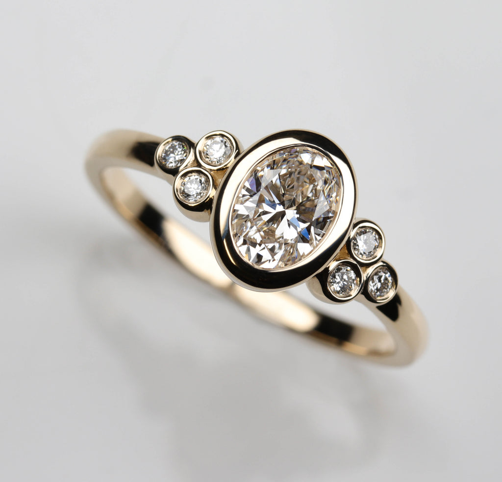 polygon ring | gokstone Images High Quality Grahic Oval Bezel-set Seven Stone Cluster Ring