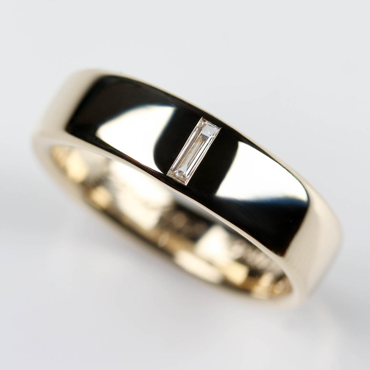 Flat Sculpted Band with Flush-set Baguette