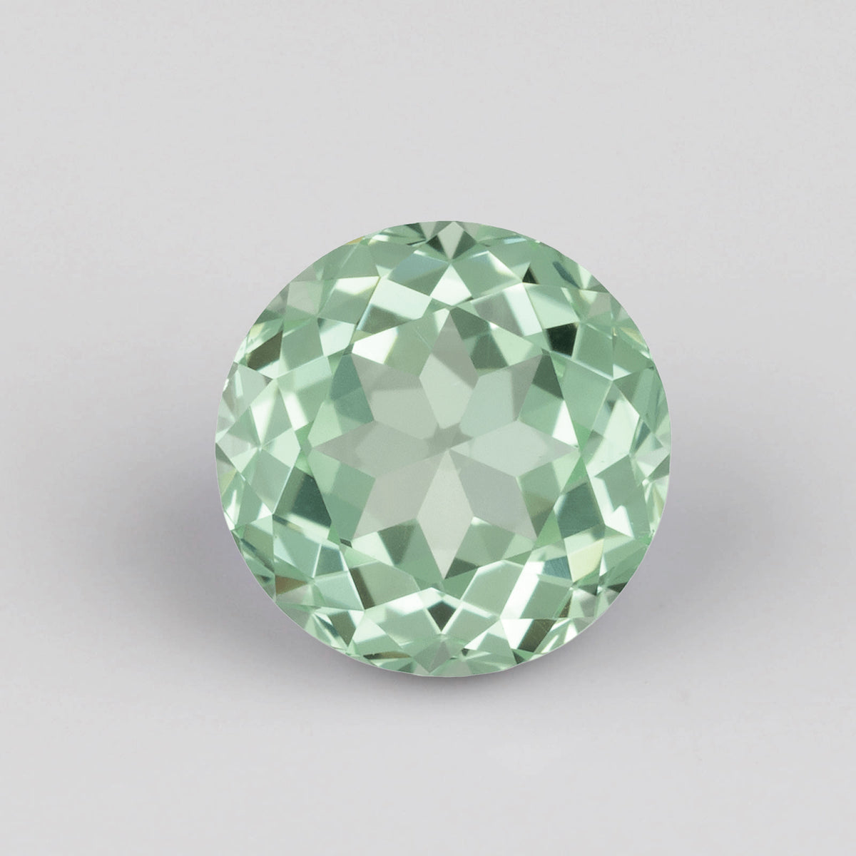 . Lab-grown Mint Green Sapphire