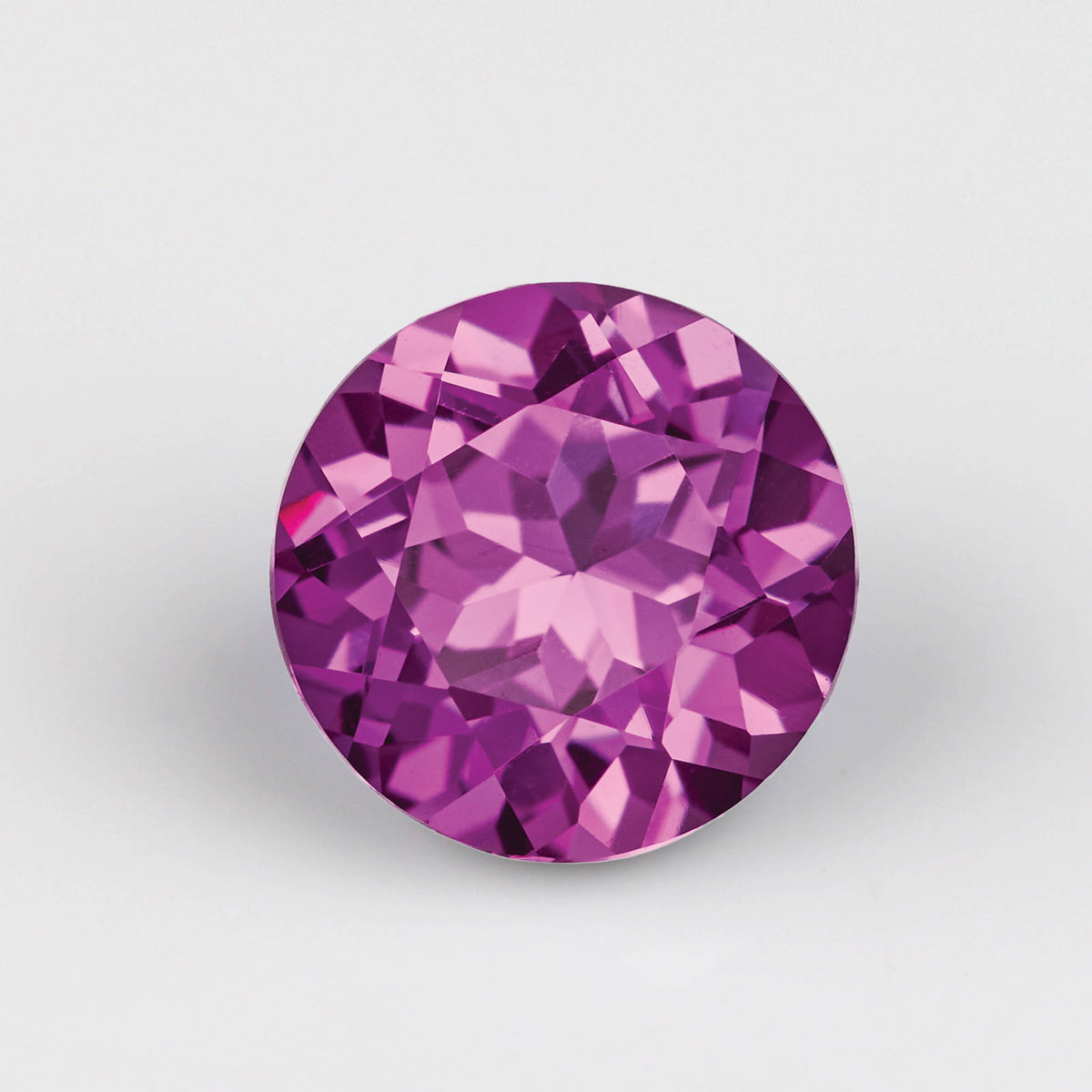 . Lab-grown Magenta Pink Sapphire