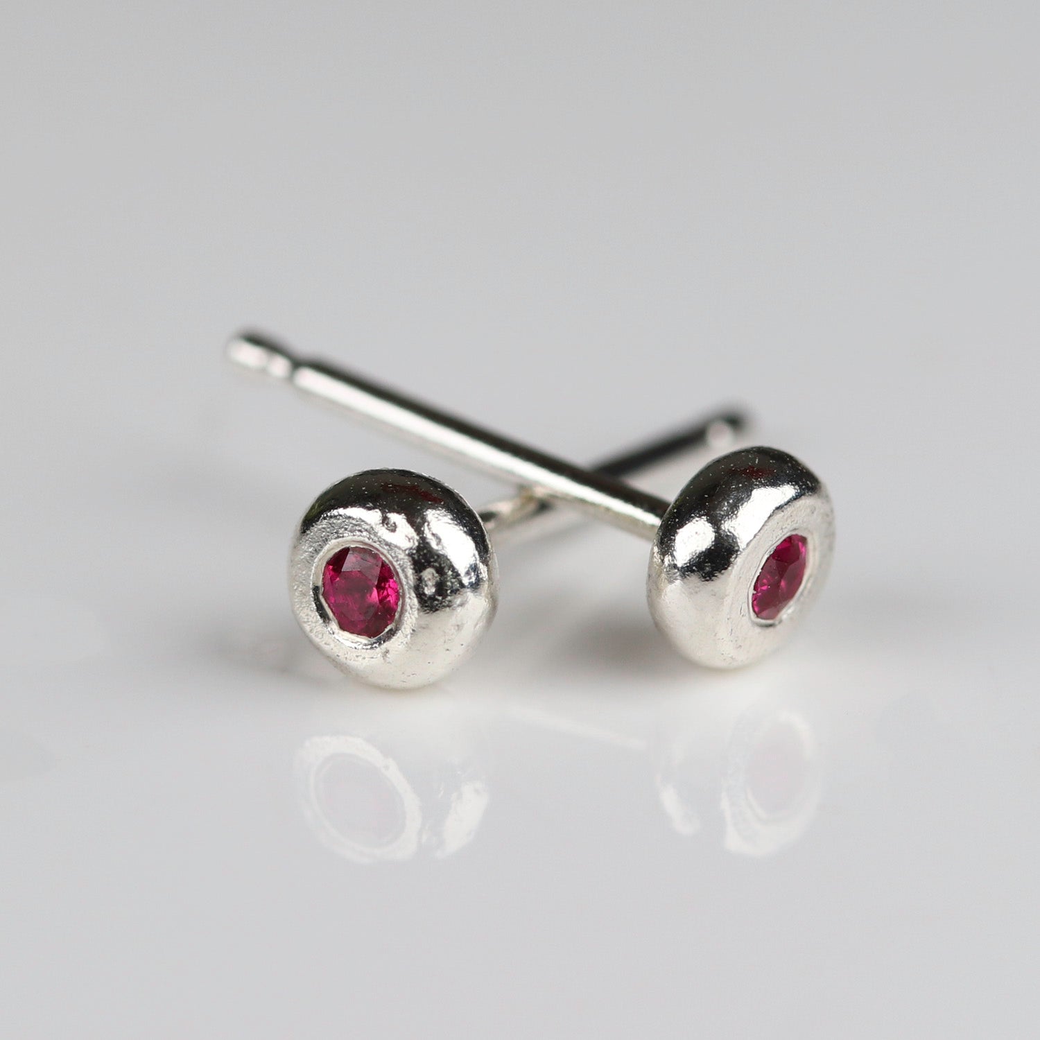 • Sterling Silver and Ruby Pebble Stud Earrings
